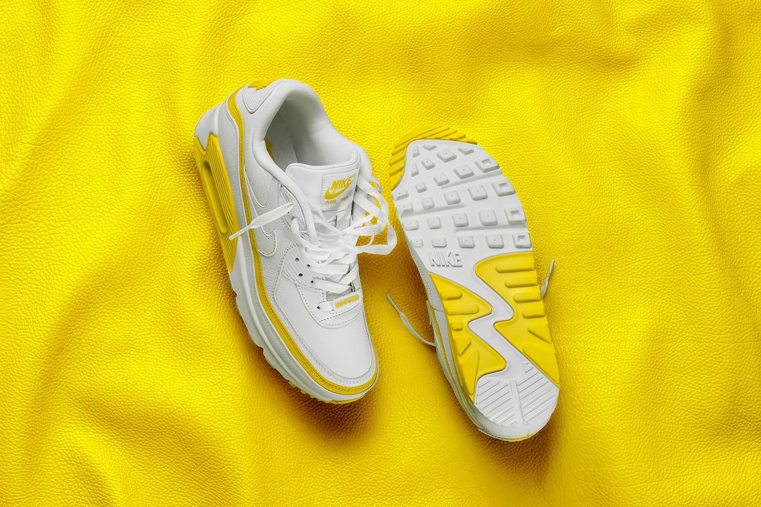 Undefeated x Nike Air Max 90 "White / Optic Yellow"