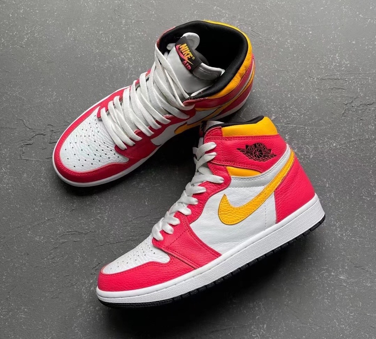 WyciekÅy zdjÄcia nadchodzÄcych Air Jordan 1 âLight Fusion Redâ