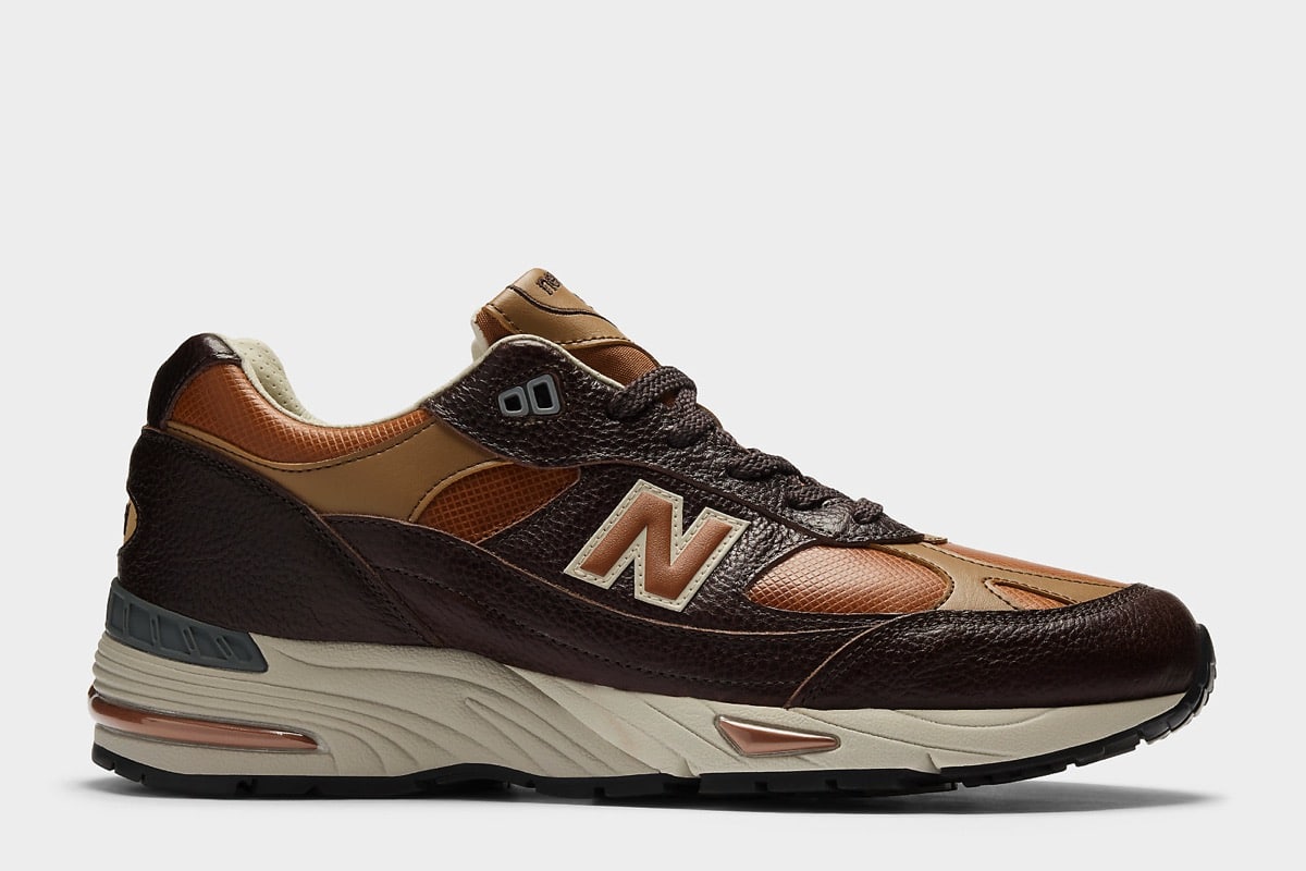 Elegancja spotyka streetwear – New Balance 991 powraca w luksusowym wydaniu
