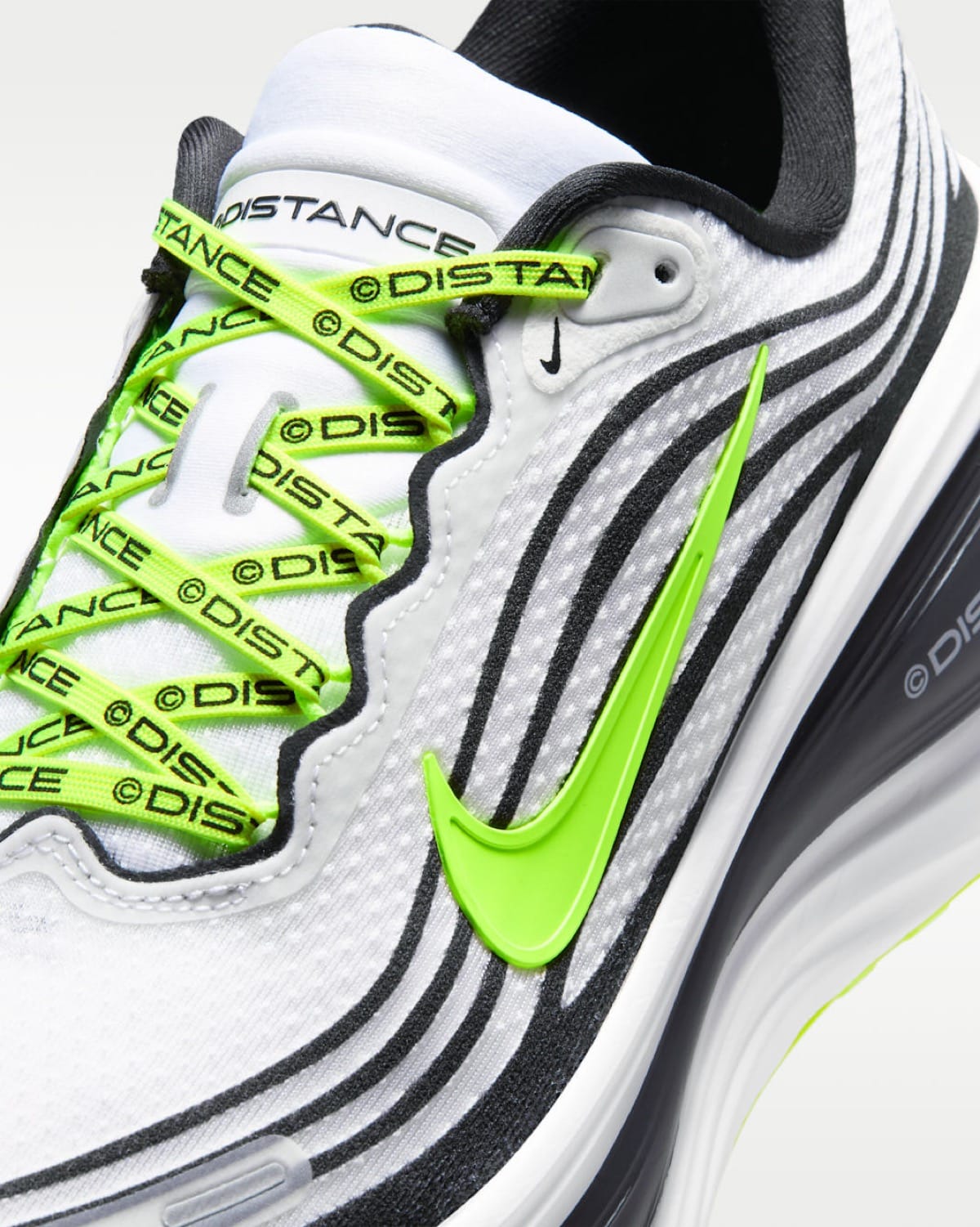 Distance x Nike Vomero Plus IQ7318-100 7
